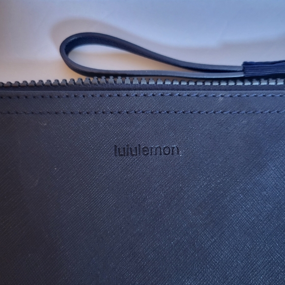 lululemon athletica Handbags - Lululemon black zip pouch NWOT